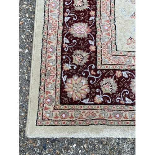 309 - A Belgian floor rug, 160cm x 230cm