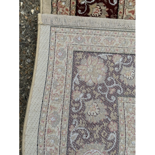 309 - A Belgian floor rug, 160cm x 230cm