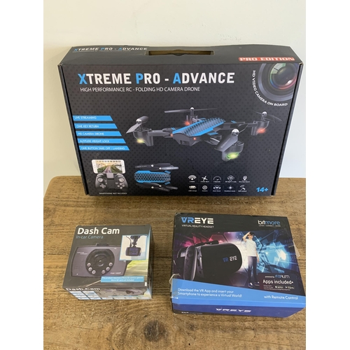 325 - A new and boxed 'Xtreme Pro-Advance' high performance folding HD camera drone, a boxed Vreye virtual... 