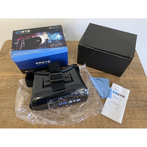 325 - A new and boxed 'Xtreme Pro-Advance' high performance folding HD camera drone, a boxed Vreye virtual... 