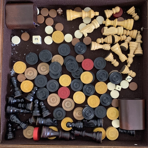 327 - A stone chess board plus a boxed chess set, a loose chess set, wooden board etc