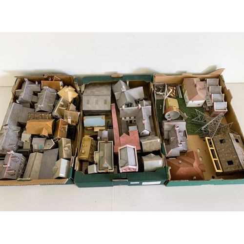 40 - A large collection over three boxes of model buildings for railway dioramas etc, most are card const... 