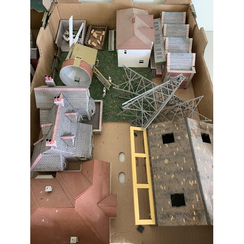 40 - A large collection over three boxes of model buildings for railway dioramas etc, most are card const... 