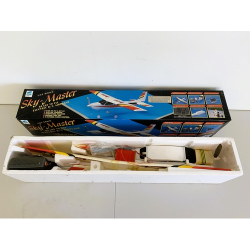 47 - A boxed Skymaster electric radio controlled airplane EM-002 (contents disturbed and signs of use, un... 