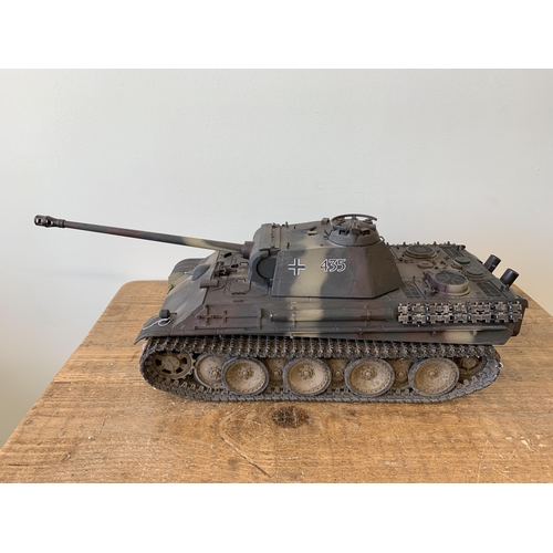 58 - A 'Torro' radio controlled die cast Panther tank with wooden box and controller, approx. 22