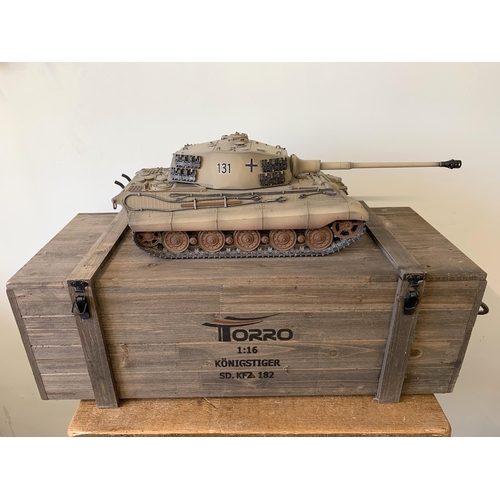 59 - A 'Torro' radio controlled die cast King Tiger tank with wooden box and controller, approx. 25