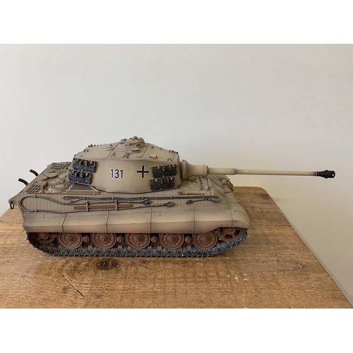 59 - A 'Torro' radio controlled die cast King Tiger tank with wooden box and controller, approx. 25