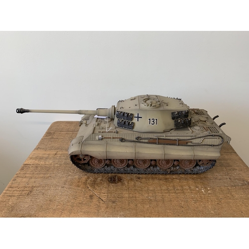 59 - A 'Torro' radio controlled die cast King Tiger tank with wooden box and controller, approx. 25