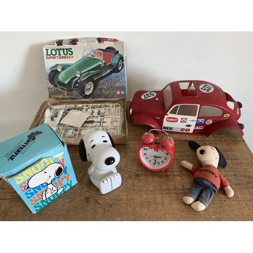 61 - A boxed Tamiya Lotus model car, plastic VW car body, boxed ceramic Snoopy etc