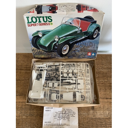 61 - A boxed Tamiya Lotus model car, plastic VW car body, boxed ceramic Snoopy etc