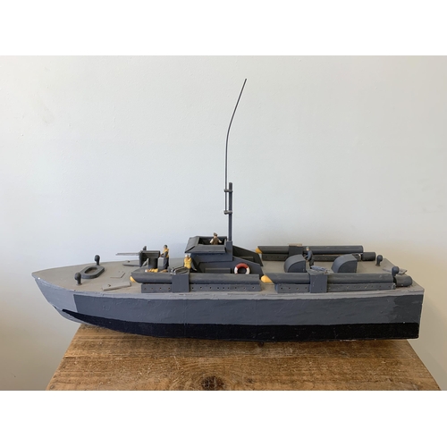 68 - A vintage scratch built military boat made of wood, 31