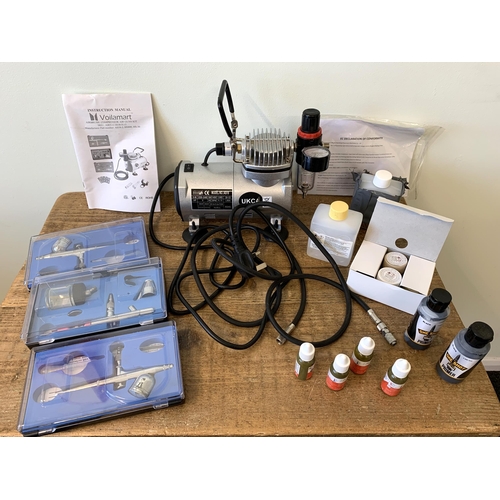 83 - A 'Voilamart' airbrush compressor air gun painting kit with accessories