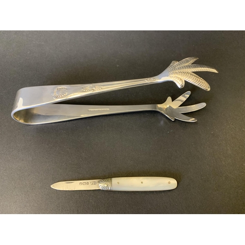 91 - A small hallmarked silver blade fruit knife plus a pair of plated ice tongs