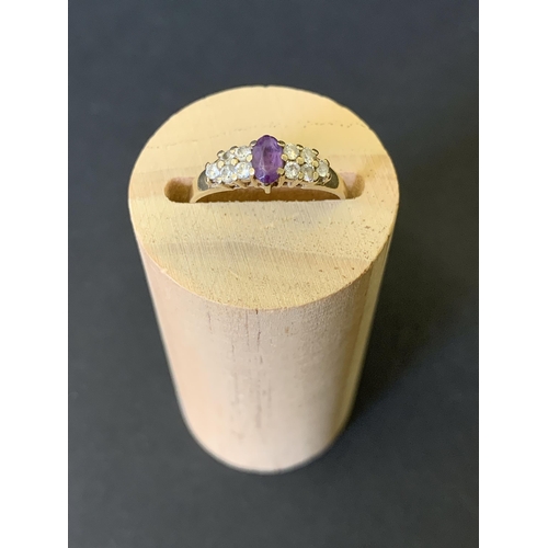 96 - A 9ct gold and amethyst with white stone ring, approx. size J 1/2, weight approx. 1.4g (band misshap... 