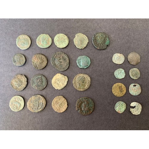 133 - A group of Roman coins including one group of very small coins