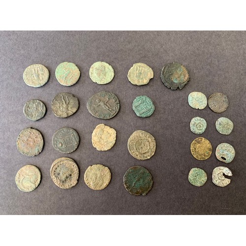 133 - A group of Roman coins including one group of very small coins