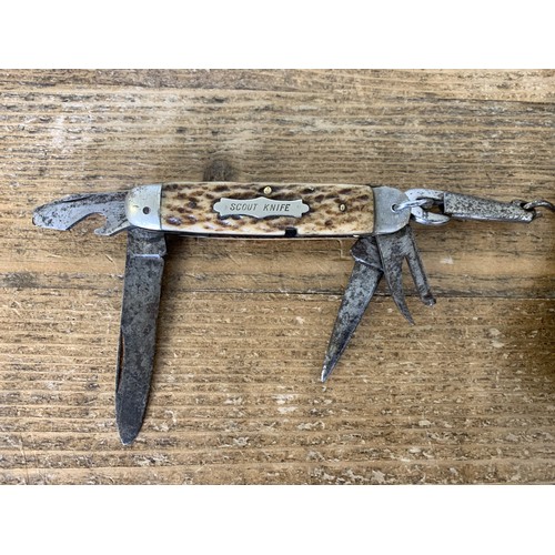 284 - A vintage Boys Scouts leather belt and buckle marked 'Be Prepared' with attached 'scout knife', mult... 