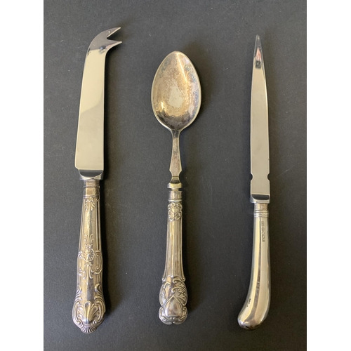 119 - A 925 sterling handle letter opener, a hallmarked silver handle cheese knife and a white metal handl... 