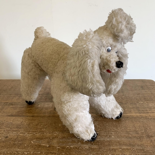 214 - A vintage toy poodle, approx. 12