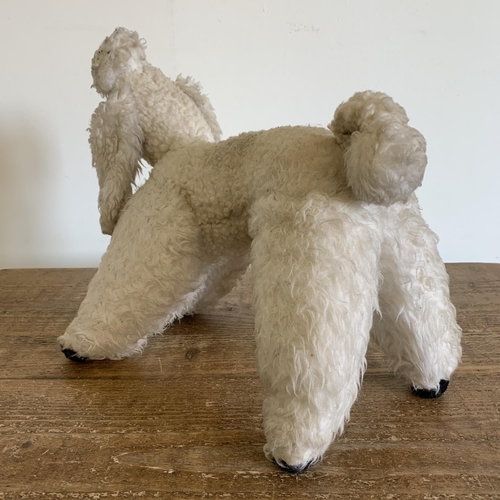 214 - A vintage toy poodle, approx. 12