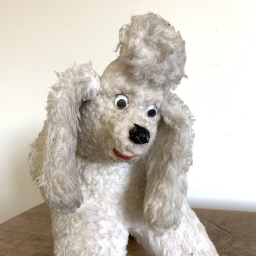 214 - A vintage toy poodle, approx. 12