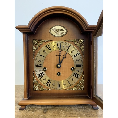 25 - A vintage wooden cased 'Rapport' bracket clock with Westminster chime and German movement, 10 1/2