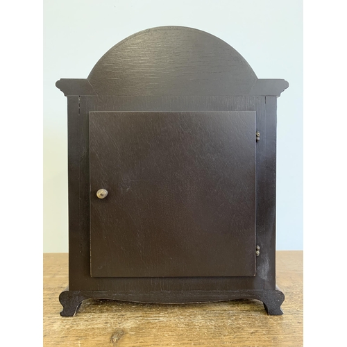 25 - A vintage wooden cased 'Rapport' bracket clock with Westminster chime and German movement, 10 1/2