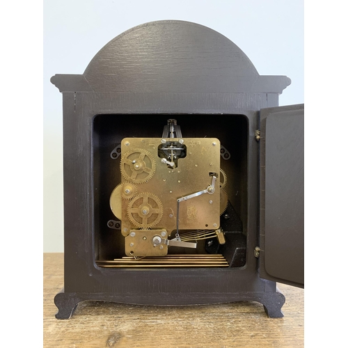 25 - A vintage wooden cased 'Rapport' bracket clock with Westminster chime and German movement, 10 1/2