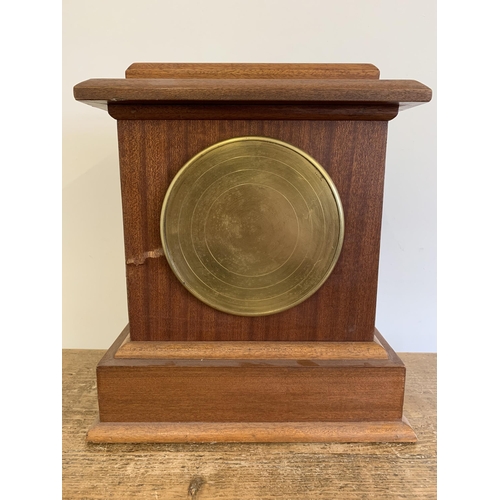 26 - A wooden cased chiming mantel clock with pendulum, key wind, approx. 13