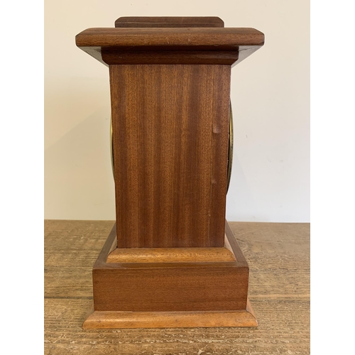 26 - A wooden cased chiming mantel clock with pendulum, key wind, approx. 13