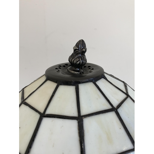 49 - A small Tiffany style table lamp, height 13 1/2