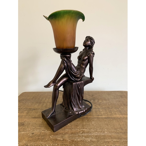 59 - A vintage resin Art Deco style semi clad lady table lamp with glass shade, approx. 17 1/4