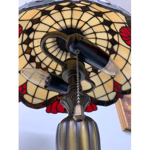 50 - A tall and heavy double bulb Tiffany style table lamp, approx. 23 1/2