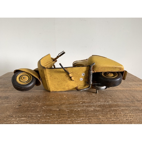 415 - A vintage 'Jayland' tin plate Vespa scooter, approx. 15