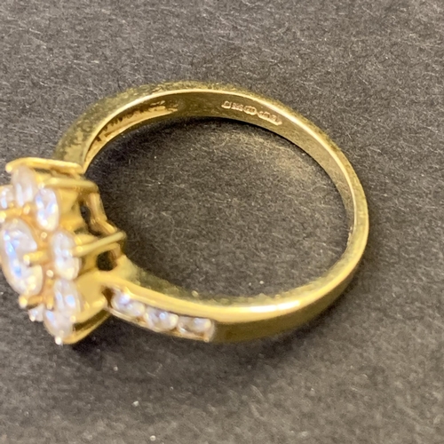 115 - A marked 585 (for 14ct gold) and CZ set ring, approx. size Q, weight approx. 3.8g