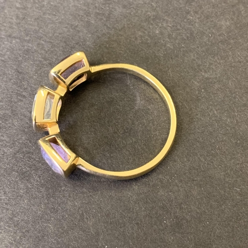 119 - An 18ct gold and stone set ring, accompanying note states 'Prasiolite and Amethyst', approx. size W,... 