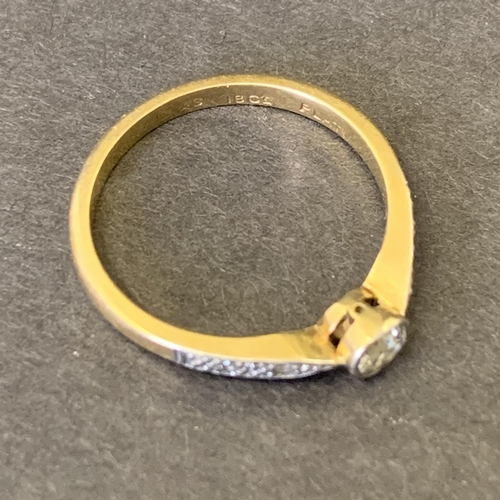 122 - An 18ct gold and platinum diamond set ring, approx. size M, weight approx. 2.4g