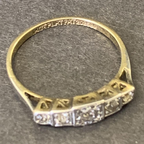 124 - An 18ct gold and platinum diamond set ring, approx. size M, weight approx. 2.1g