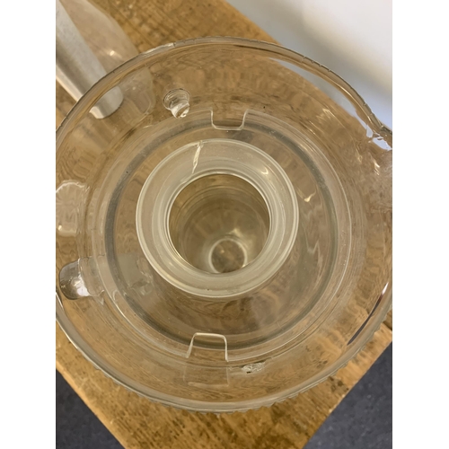 13 - A large vintage cut glass cooling jug with central column for ice to chill liquid, 10 3/4