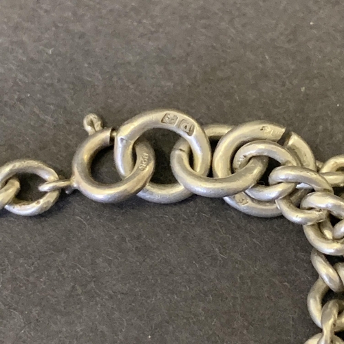 131 - A hallmarked short silver watch chain, weight approx. 25g plus a white metal S Mordan & Co propellin... 