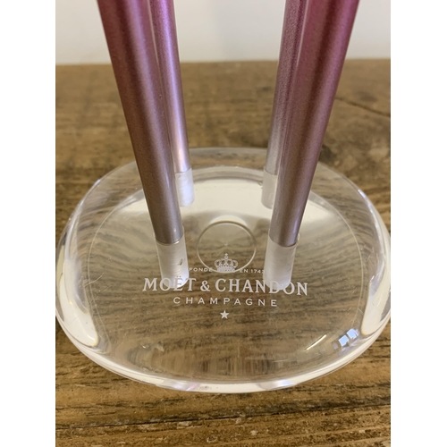 16 - An elegant Moet & Chandon stand for four champagne glasses, 13