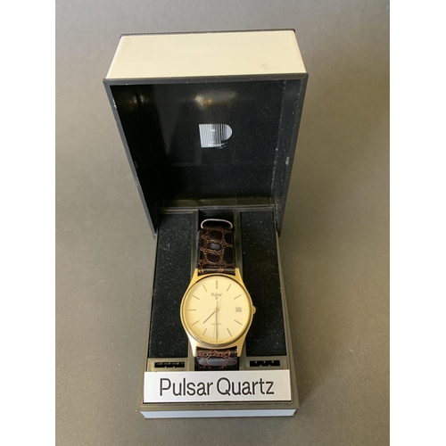 174 - A boxed Pulsar quartz wristwatch on leather strap, 32mm dia