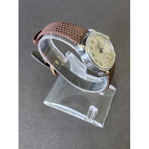 175 - A 1940's military style Pierce Parashock wristwatch, 26mm dia (replacement strap, slight scratch acr... 