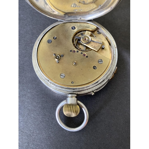 176 - An antique silver large pin set pocket watch, 55mm dia (running at the time of lotting)