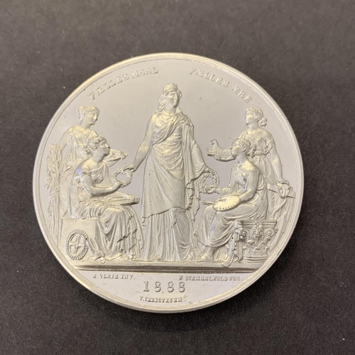 181 - An 1888 Denmark Nordic Exhibition medal in white metal, in half case, 52mm dia