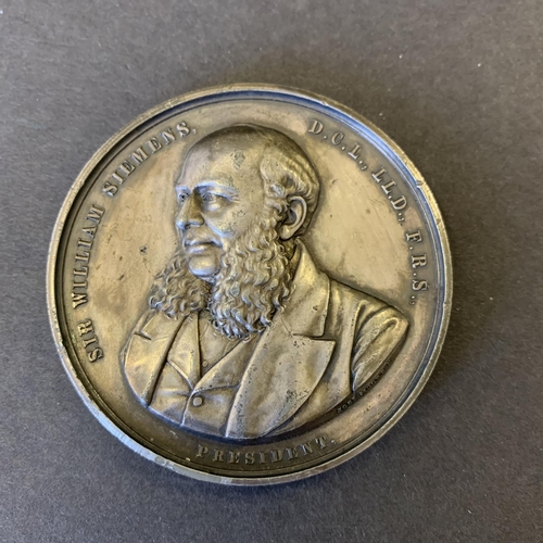 184 - A white metal Sir William Siemens Birmingham & Midland Institute medal, dated 1854, 63m dia