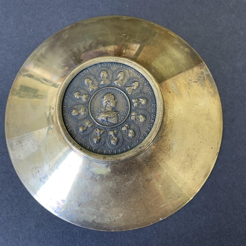 195 - A brass bowl with a Franciscus and Maria Theresia bronze medal inserted into the base, attributed to... 