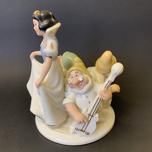 208 - A Lenox Disney fine ivory china 'Snow White and the Seven Dwarfs' candlestick 2002, 6 3/4