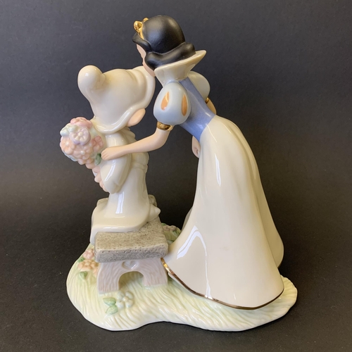 209 - A Lenox Disney fine ivory china 'Dopey's Sweet Reward' figurine, 7 1/2