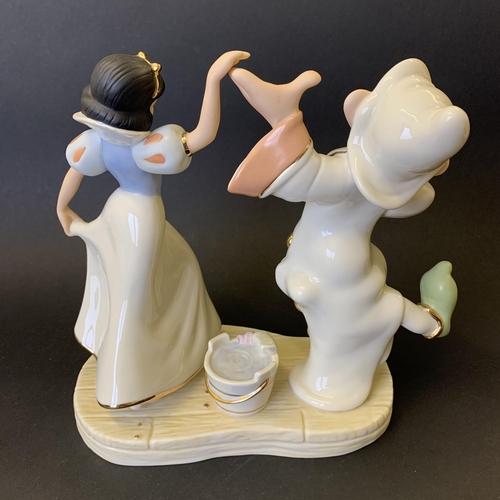 210 - A Lenox Disney fine ivory china 'Dancing with Snow White' figurine, limited edition 3181/3500', 6 3/... 